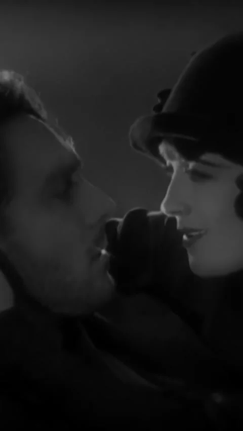 USA - 1927 - In this silent drama, two lovers hold each other in a passionate Stock Footage 342857571