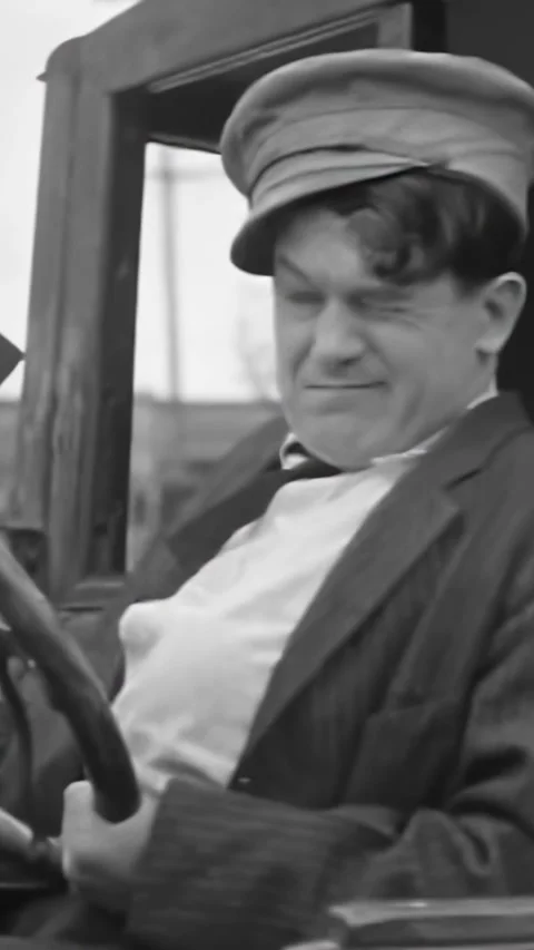 USA - 1928 - In this silent comedy, a cab driver picks up a pretty woman while Stock Footage 339490020