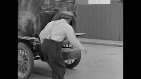 USA - 1928 - In this silent comedy, a cab's engine explodes and the driver Stock Footage 288011352