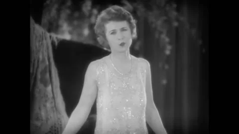 USA - 1928 - Vaudeville singer Adele Rowland performs a verse of "There Must Be Video stock 277299181