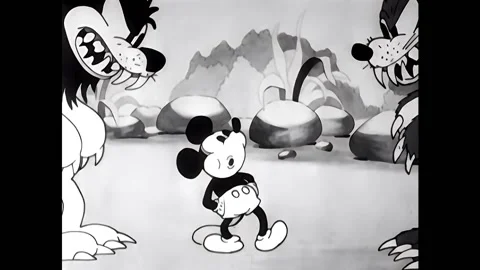 USA - 1929 - In this cartoon, Mickey Mouse stops a bear and lion from attacking Video stock 301525975