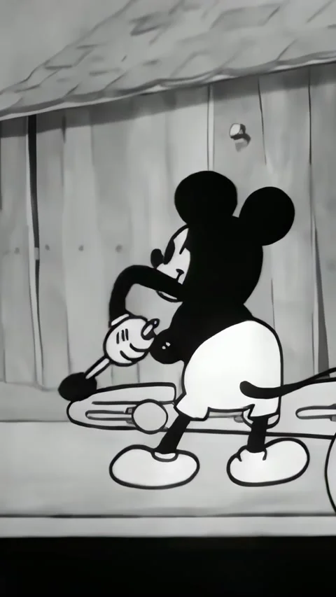 USA - 1929 - In this cartoon, Mickey Mouse finishes a barnyard revue by playing Stock Footage 340209147
