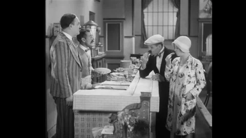 USA - 1929 - In this comedy, two people try sausages at a diner. They continue Stock Footage 341990013