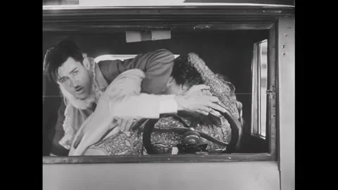 USA - 1929 - In this silent comedy, a cop breaks up a fight among a couple and Stock Footage 340573612