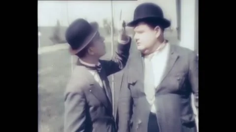 USA - 1929 - In this silent comedy, two men (Laurel and Hardy) steal wooden Stock Footage 284812803