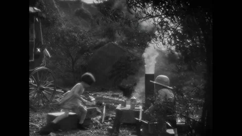 USA - 1930 - In this comedy, a chicken's eggs hatch for children on a camping Stock-Footage 323265811