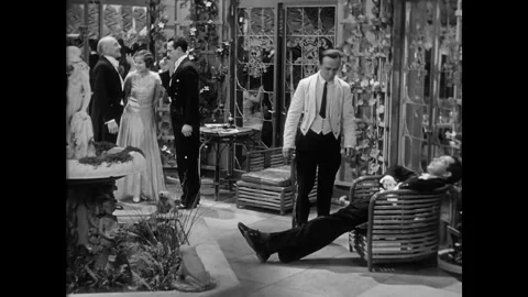 USA - 1930 - In this comedy, a drunk guest at a classy party takes a man (Harold Stock Footage 341337095