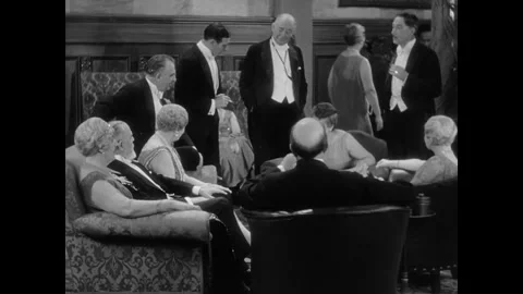 USA - 1930 - In this comedy, a drunk man introduces a socially awkward Stock Footage 341336957