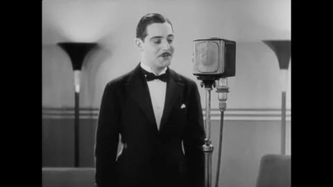 USA - 1930 - In this comedy, a junkyard worker is invited to tell a tall tale on Stock Footage 340590458