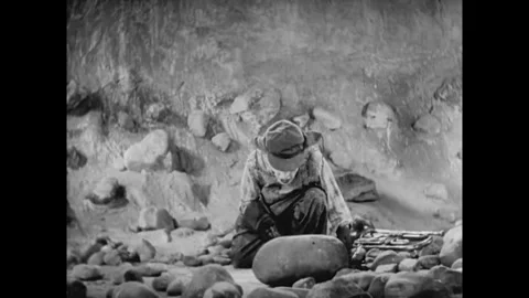 USA - 1930 - In this comedy, a man dips a worm (animated with stop-motion) into Stock Footage 340590464