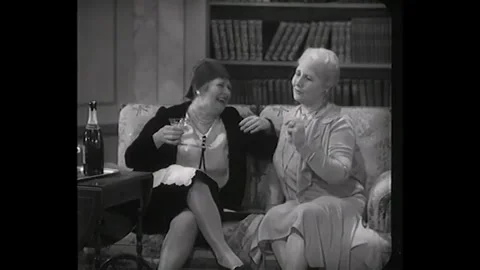 USA - 1930 - In this comedy short, a drunk woman speaks with two other women in Stock Footage 341980882