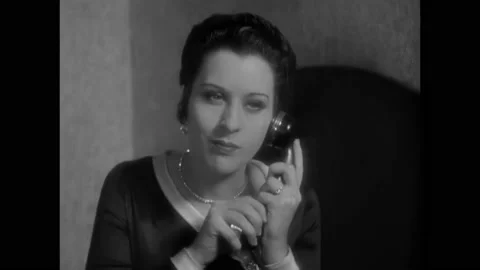 USA - 1930 - In this comedy, Stan Laurel's wife eavesdrops on his and Oliver Stock Footage 323085252
