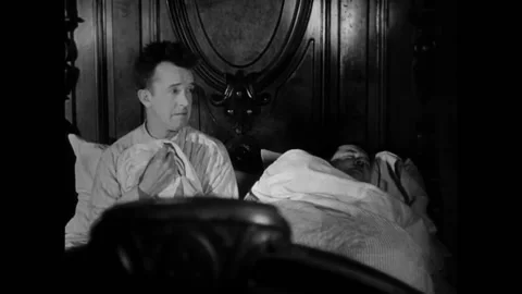 USA - 1930 - In this comedy, two men get into a bed, one man is scared and they Stock-Footage 325211354