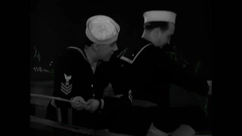 USA - 1930 - In this comedy, two sailors speak in a rowboat. Talk about a dead Stock Footage 327751607