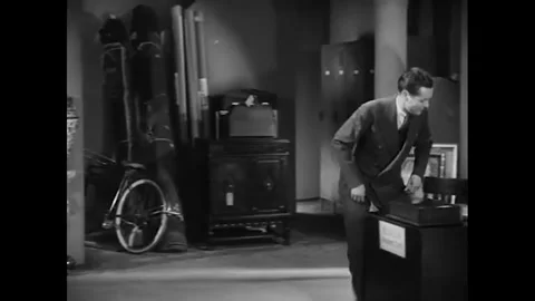 USA - 1930 - In this musical comedy, two men speak in a room filled with Vidéo 341989632