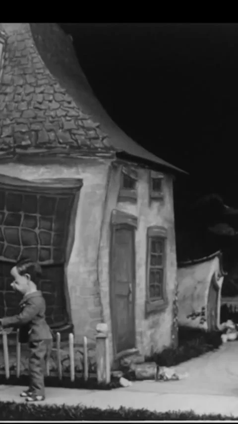 USA - 1930 - In this stop-motion animated film, a boy breaks a girl's window Stock Footage 338423878