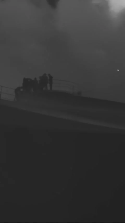 USA - 1930s - A ship docked in a cold harbor is engulfed in flames and smoke. Stock Footage 342263756