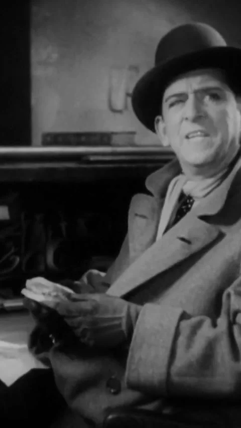 USA - 1931 - In this American pre-code comedy drama film, a man looks up from 스톡 동영상 342989776