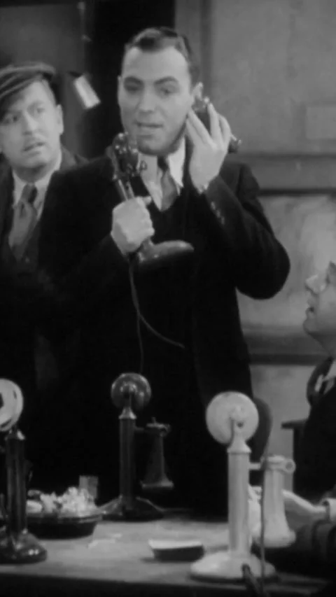 USA - 1931 - In this American pre-code comedy drama film, a group of men sit Stock Footage 342990893