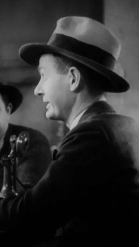 USA - 1931 - In this American pre-code comedy drama film, a group of men sit Stock Footage 342991271