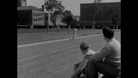 USA - 1931 - In this comedy, men meet at a track and a boy runs up. A man with Stockbeeldmateriaal 325216545