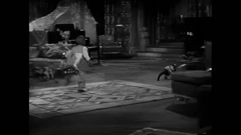 USA - 1931 - In this comedy, a monkey throws vases and light bulbs at a boy 스톡 동영상 323259669