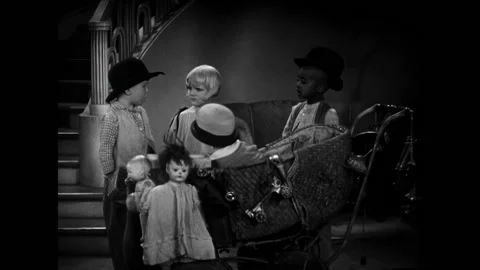 USA - 1931 - In this comedy, two boys try to sell a doorknob to a little girl. Stock Footage 323260935