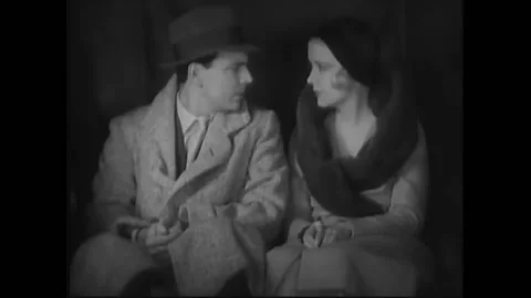 USA - 1932 - In this pre-code drama, a couple rides and a taxi together. The Stock Footage 327735750