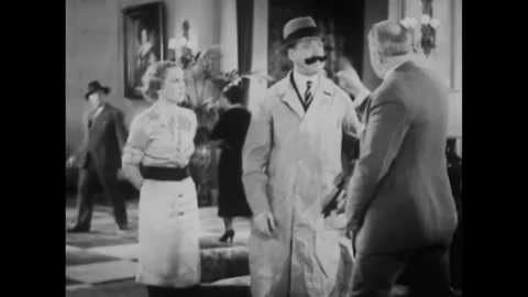 USA - 1934 - In this comedy short, two men argue and one tries to pull the Stock Footage 341980677