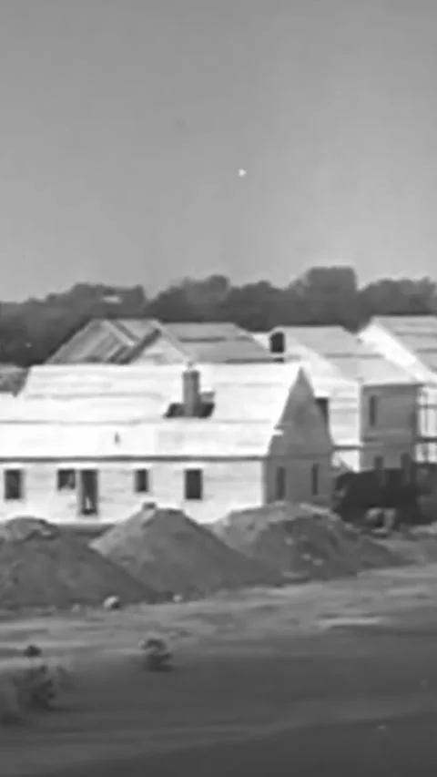 USA - 1935 - Construction workers take a well-earned lunch break, and the Stock Footage 339104389