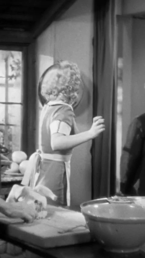 USA - 1936 - in this comedy, a customer interrupts the maid and the cook who are Stock Footage 343007927