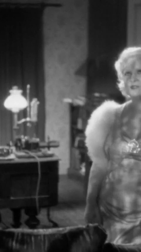 USA - 1936 - in this comedy, the moonlight and music inspire a woman to sing. A Stock Footage 343007936