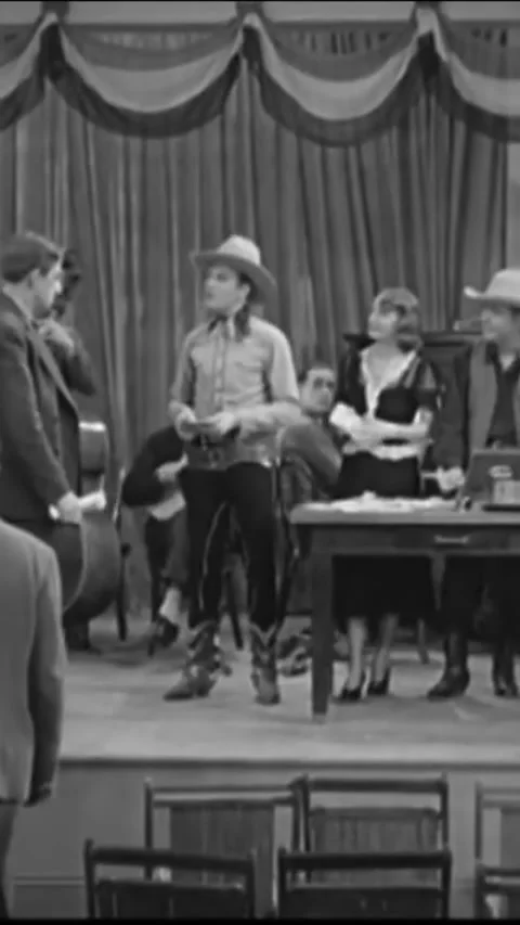 USA - 1937 - In this dramatic American Western film, a cowboy introduces a group Stock Footage 343000472