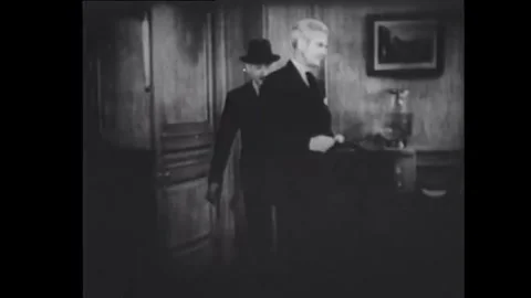 USA - 1938 - In this comedy, two men come into an office and one takes nerve Stock Footage 341973958