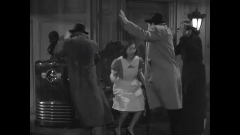 USA - 1939 - In this comedy horror, three detectives are startled by a radio. An Stock Footage 341975277