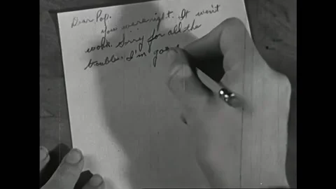 USA - 1940 - In this comedy, a boy writes a note and cries. A dog drops him a Stock Footage 323222983