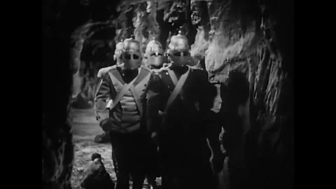 USA - 1940 - In this science fiction, two groups of soldiers fight in a cave. Stock Footage 341976202