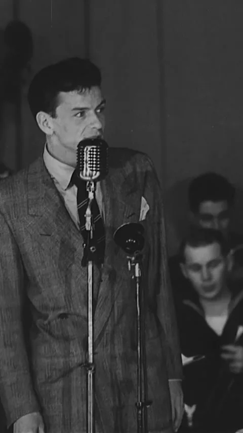 USA - 1940s - Frank Sinatra concludes crooning "The Song Is You" for Stock Footage 342951198