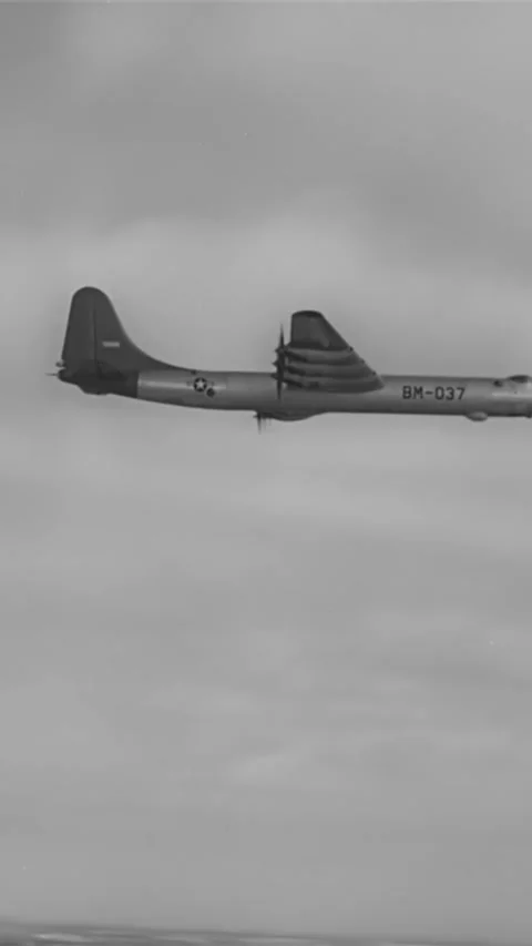 USA - 1940s - A squadron of US Army Air Force bombers in flight. Stock Footage 339108792