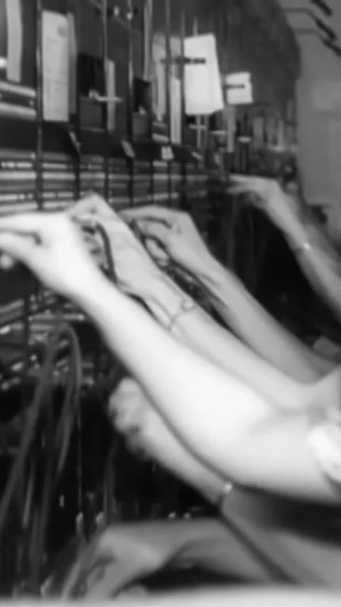 USA - 1940s - Switchboard operators connect calls at an atomic power plant. Stock Footage 342255632