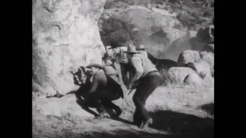 USA - 1941 - In this western comedy, a shootout between sheriffs and outlaws in Stock Footage 325201685