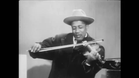 USA - 1942 - Ray Nance solos on the fiddle and Rex Stewart on the trumpet during Stock Footage 272363493