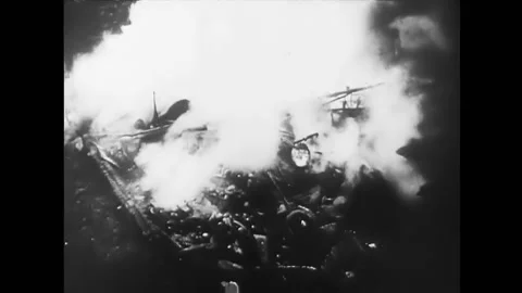 USA - 1943 - Bombs explode and the destruction of buildings is seen. Stock Footage 327749970