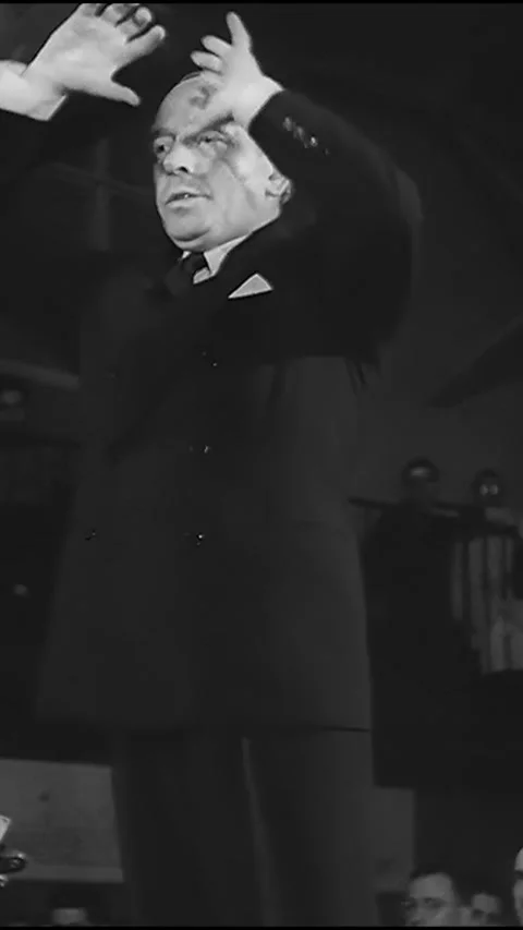 USA - 1943 - Eugene Ormandy conducts the Philadelphia Orchestra at the US Naval Stock Footage 342822258