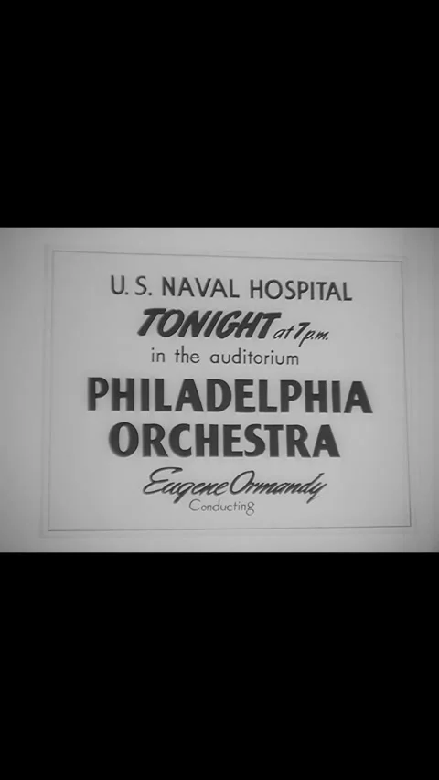 USA - 1943 - Signs advertisement a performance of the Philadelphia Orchestra at Stock Footage 342821992