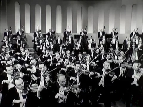 USA - 1943 - Woodwinds, strings, and percussion are used in a symphony Stock Footage 331099110