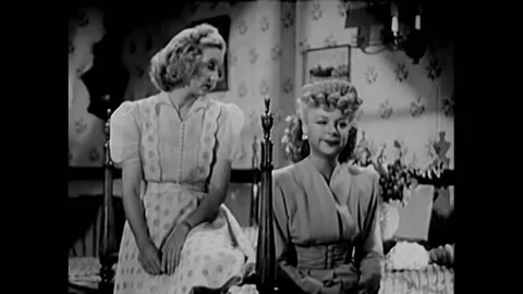 USA - 1944 - In this musical comedy, two women speak in an apartment about a Vídeos de archivo 328189316