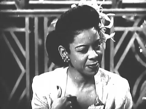 USA - 1945 - Dotty Saulters concludes singing a love song backed by Cab Stock Footage 331099170