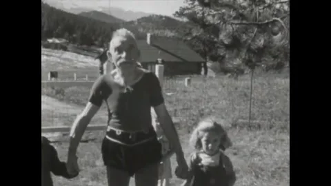 USA - 1946 - 80-year-old aviator and former circus performer Ivy Baldwin walks a Stock Footage 340591081