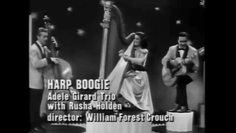 USA - 1946 - The Adele Girard trio begin playing "Harpo Boogie" while a woman Video stock 254193082